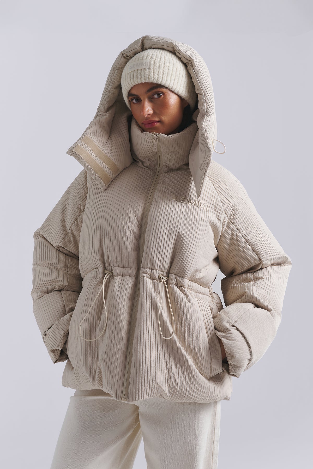 Textured recycled puffer jacket for women by AEMMI