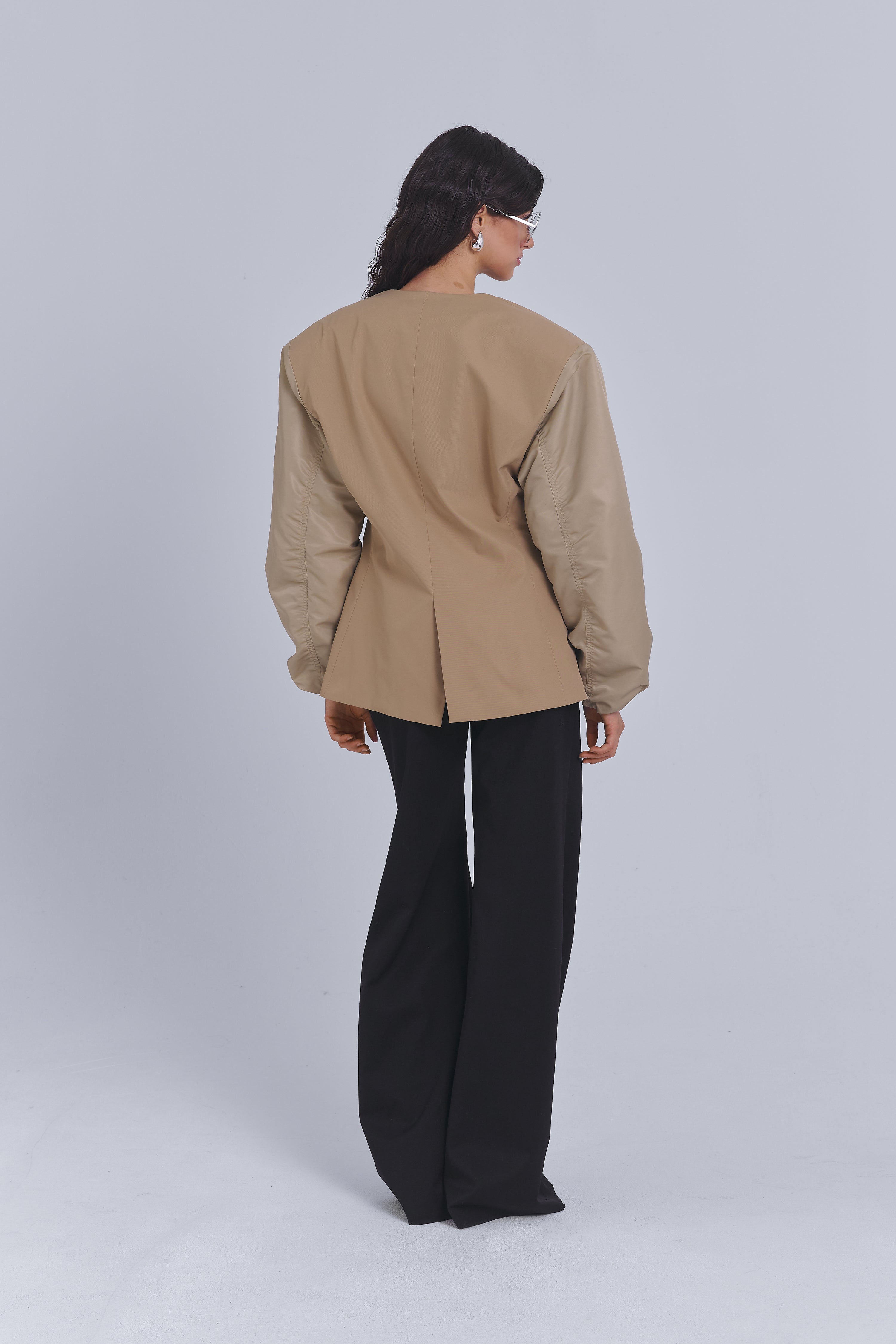 Beige oversized blazer with bomber-style sleeves by AEMMI